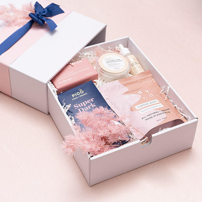 Black luxury slide-out drawer box with golden ribbon pull